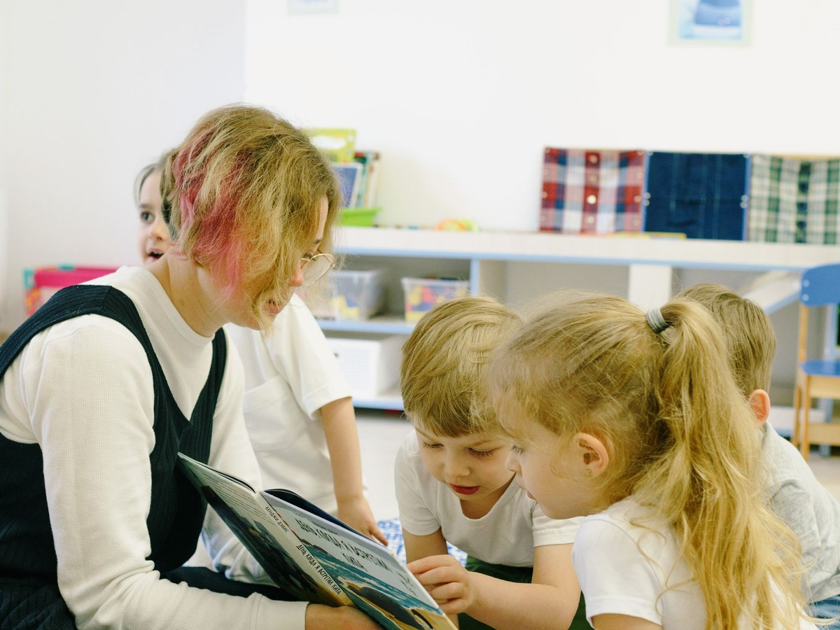 Teacher conducting a storytelling session for young learners