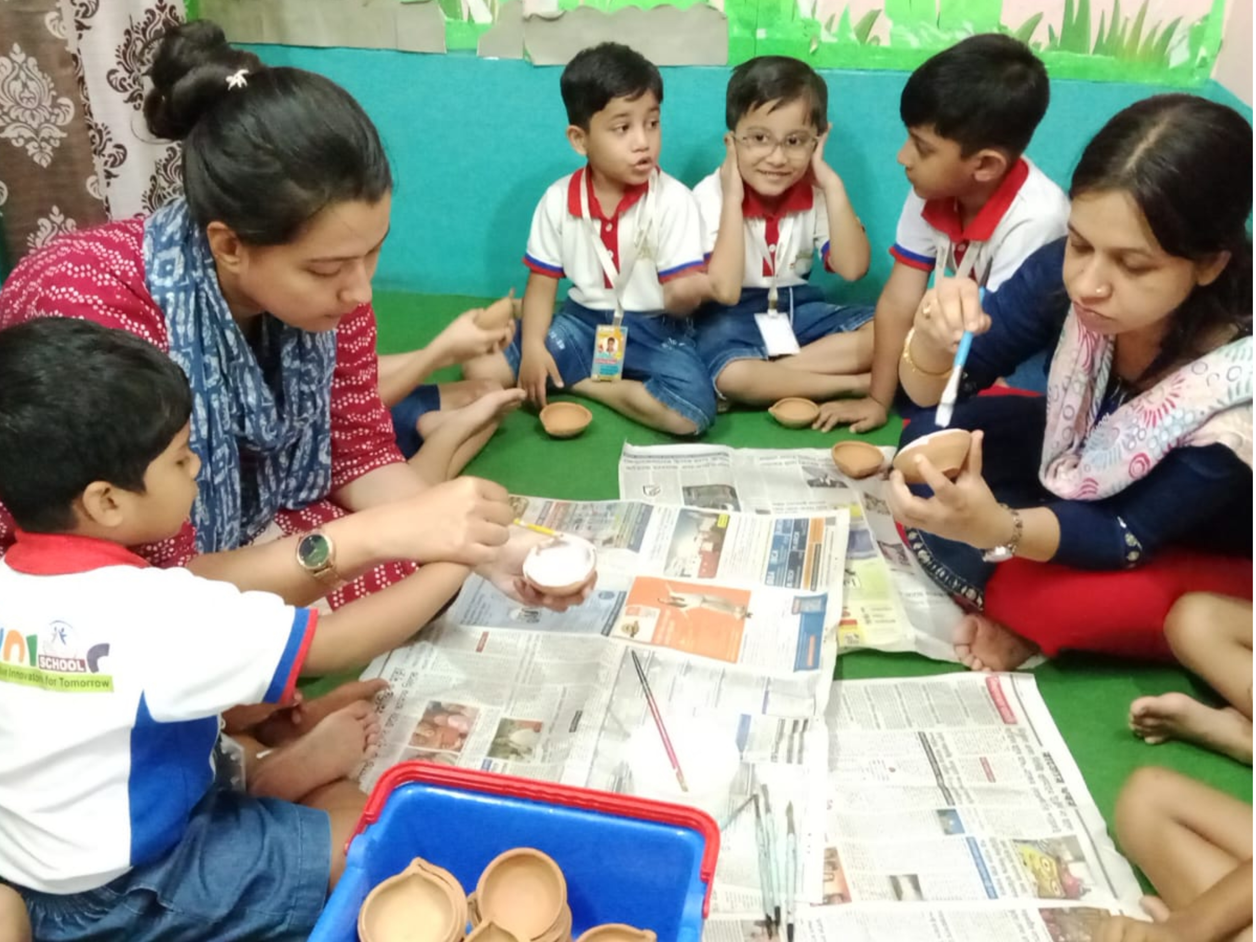 Teacher observing learners during a classroom activity